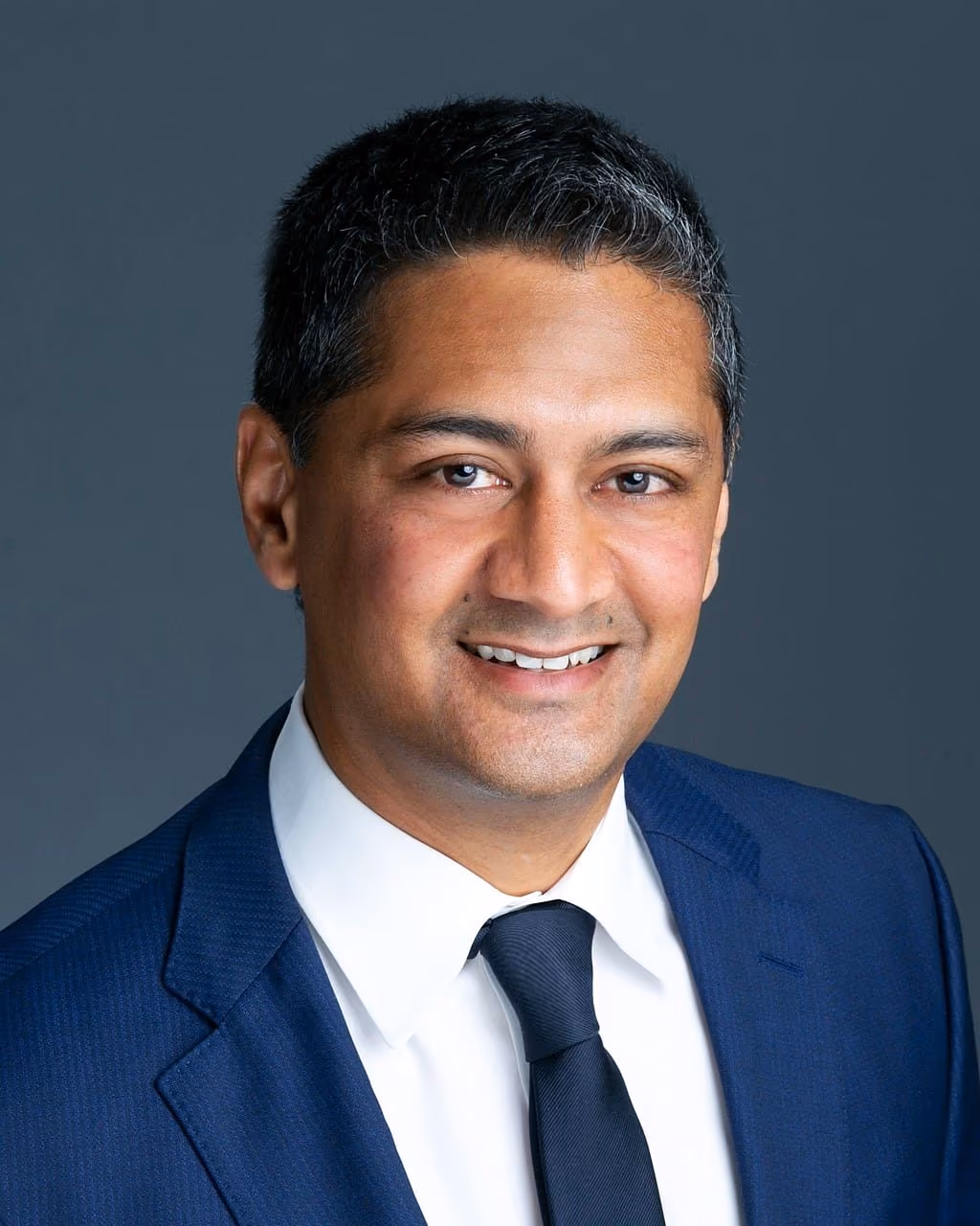 A corporate portrait retouched with a natural finish