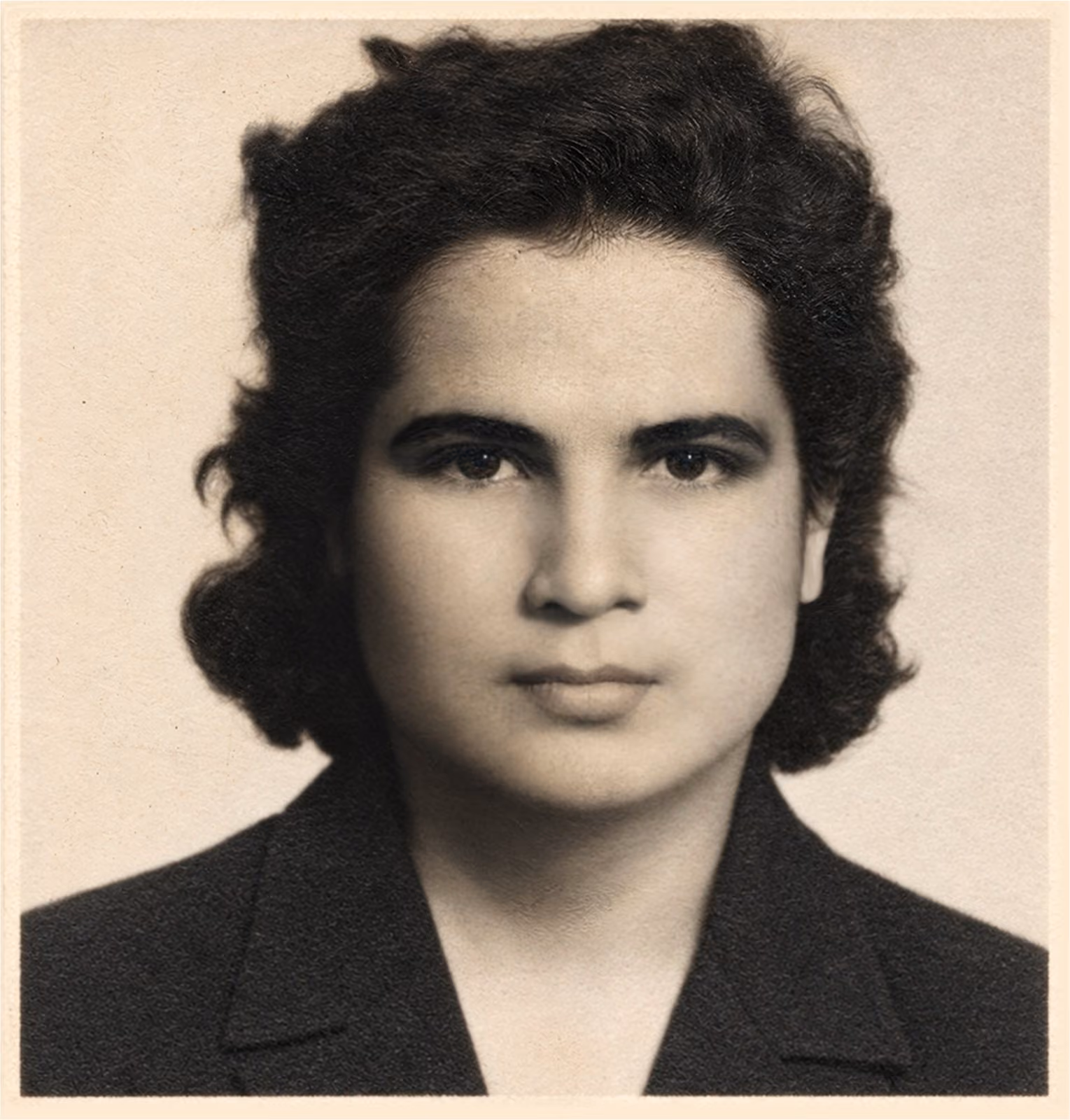 After: Passport-style portrait of a woman with dark wavy hair, restored from a blurred print with an ink stamp