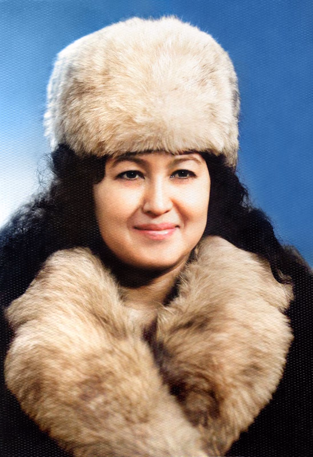 After: Portrait of a woman in a fur hat and fur collar, restored from a black and white print and brought into colour